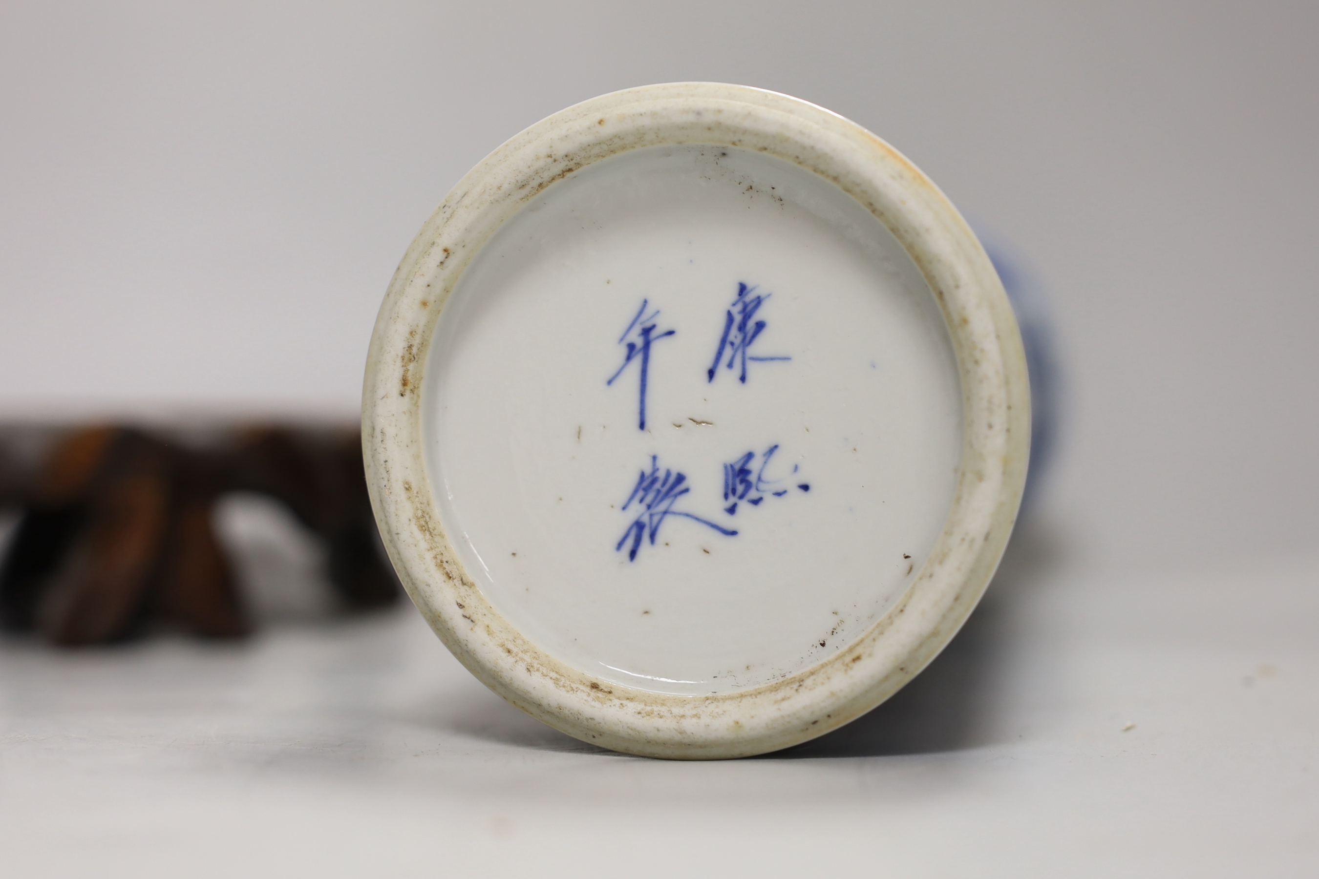 Two 19th century Chinese blue and white cylinder vases, one on stand and a pair of famille verte cylinder vases, tallest 30cm high